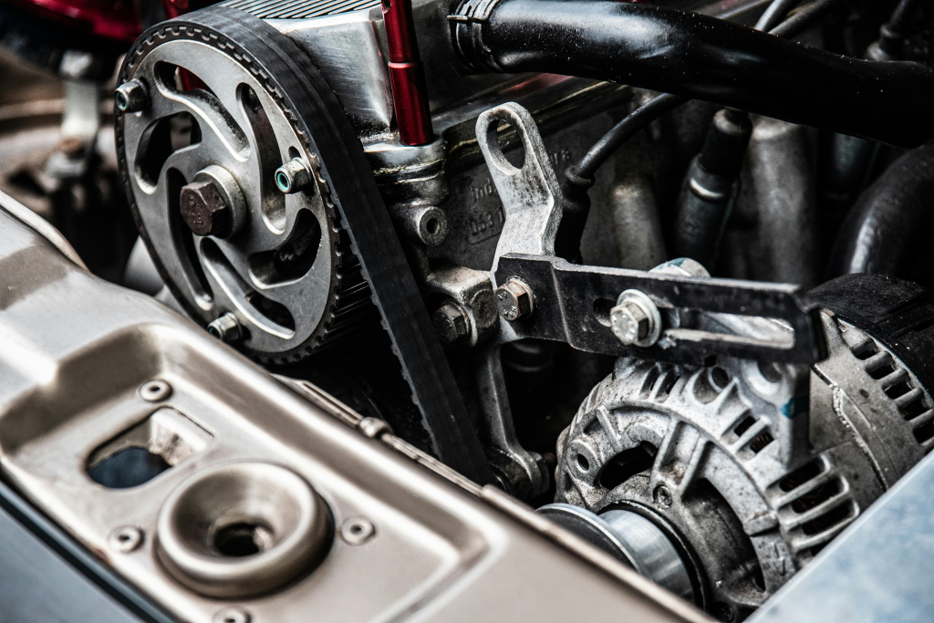 Close-up view of a forklift engine and belt system serviced by Forklift Guy in Calgary, AB. Engine Diagnostics — forklift repair calgary