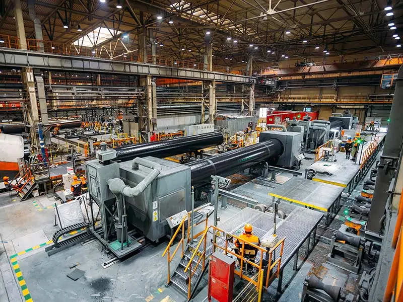 Large-scale industrial machinery inside a manufacturing facility, used for equipment appraisal and valuation purposes.