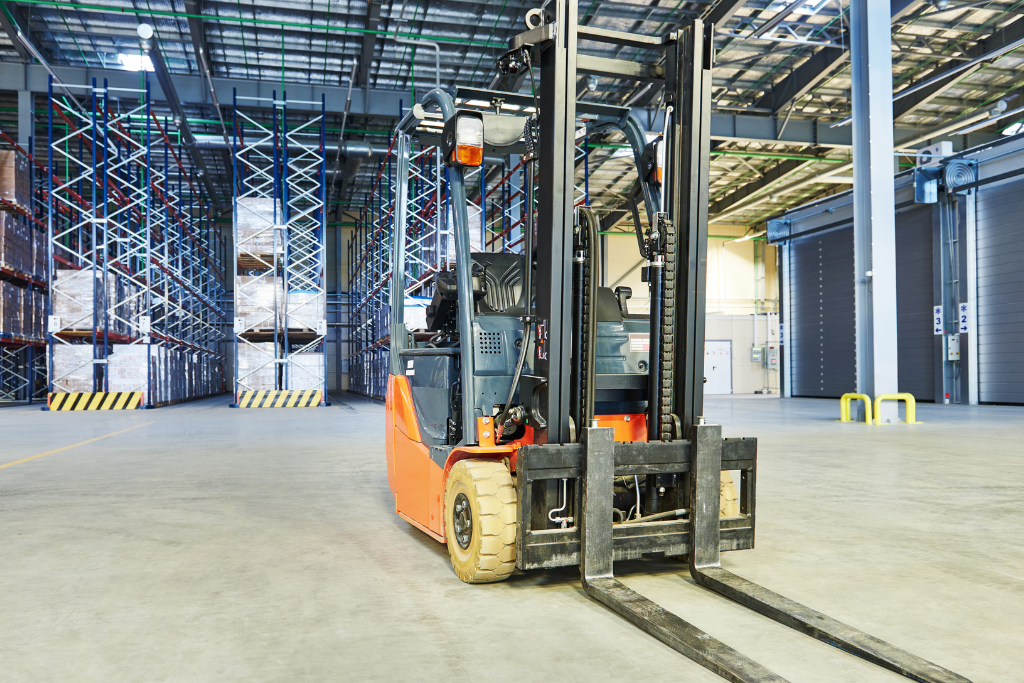 technician inspection at forklift dealer calgary service bay