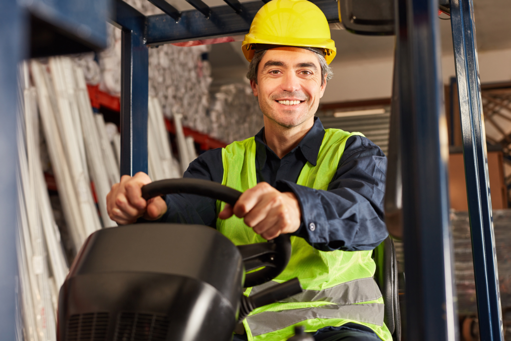 trainee receiving wallet card after forklift license calgary